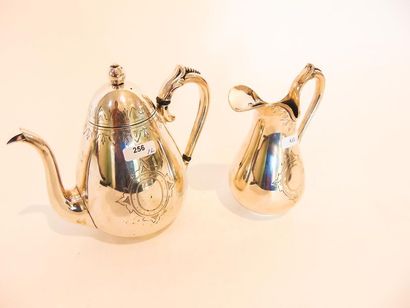 HOLLANDE Piriform teapot and milk jug, 1874, chased silver, punches, h. 15 cm and...