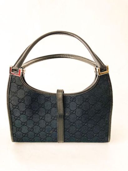 GUCCI Handbag in black monogrammed canvas, with cover, l. 26 cm.