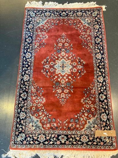 null Small Kerman style Persian rug with central medallion and polychrome floral...