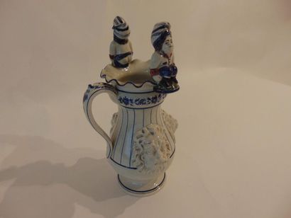 null Amusing baluster ewer on a pedestal decorated with mufles and two Jacquots in...