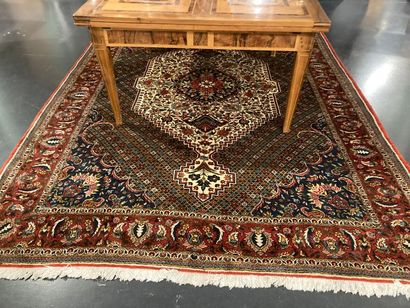 null Large Keshan style Persian carpet with central medallion and polychrome floral...