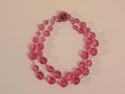 null Set of three pink monochrome fantasy necklaces.