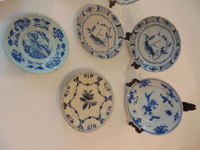 null Set of antique stanniferous earthenware plates with monochrome decorations,...