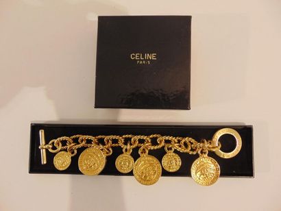 CELINE - PARIS Bracelet with golden metal charms, marked, with box, l. 23 cm.