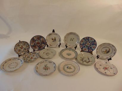 null Set of antique plates in stanniferous earthenware with polychrome decorations,...