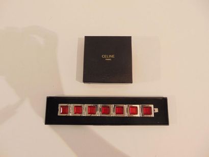 CELINE - PARIS Bracelet articulé en métal argenté serti façon rubis, marqué, avec...