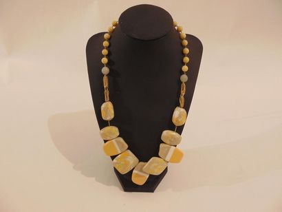 null Set of three fancy necklaces.
