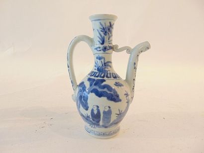 CHINE Three small ewers (including a pair with pans) with animated blue and white...