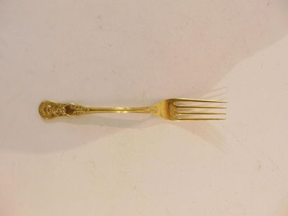 null Two dozen Rocaille forks and spoons, gilt in their covers, punches, approx....