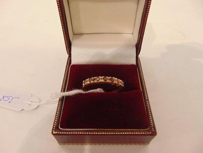 null Ring in 18 karat yellow gold set with a line of rubies, t. 54, approx. 2 g.