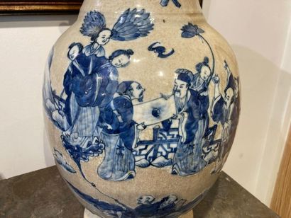 CHINE Large baluster with blue and white decoration in slight relief on a cracked...