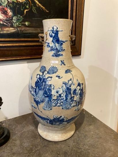 CHINE Large baluster with blue and white decoration in slight relief on a cracked...