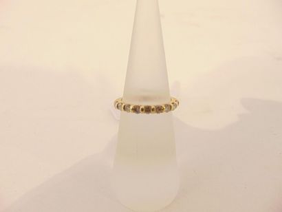 null Ring in 18 karat yellow gold set with a line of diamonds, t. 47, approx. 2 ...