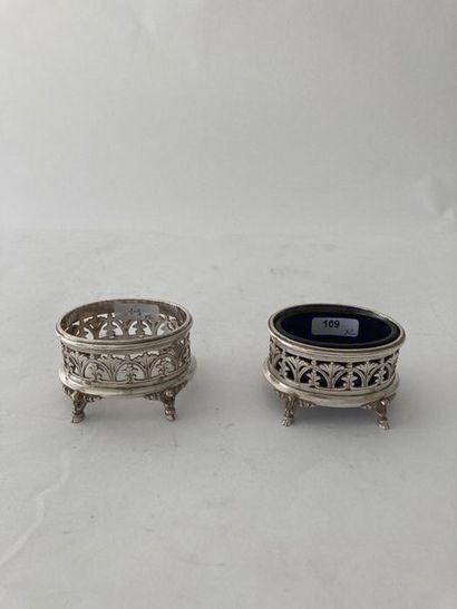 HALPHEN Pair of oval quadripod salt shakers, early 20th century, silver plated metal,...