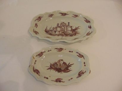 France Two oval scrolled dishes with Rocaille decoration in manganese monochrome,...