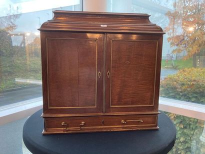 null Elegant Louis XVI period cabinet with a drawer and two doors opening to reveal...