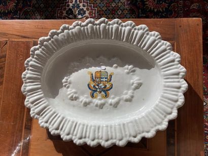 France Polylobed and gadrooned oval dish with polychrome decoration of coats of arms,...