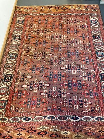 null Kazak-style Caucasian carpet with polychrome geometric patterns on a Capuchin...