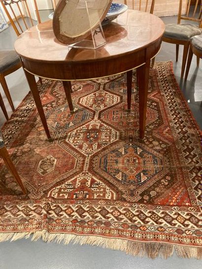 null Kazak-style Caucasian carpet with polychrome geometric patterns, approx. 242x170...