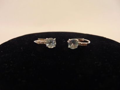 null Pair of 18 karat white gold earrings set with aquamarine and brilliants, h....