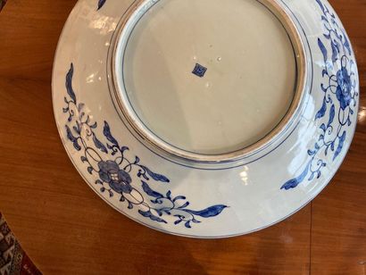 null Large deep dish with far eastern blue and white decoration of two dragons facing...
