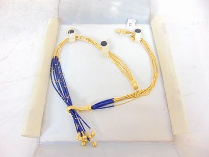 null Neglected in 18 carat yellow gold and lapis lazuli, punched, with pouch, l....
