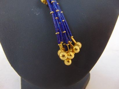 null Neglected in 18 carat yellow gold and lapis lazuli, punched, with pouch, l....