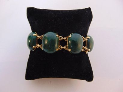 null Bracelet in 18 carat yellow gold set with malachite cabochons, punch, l. 18...