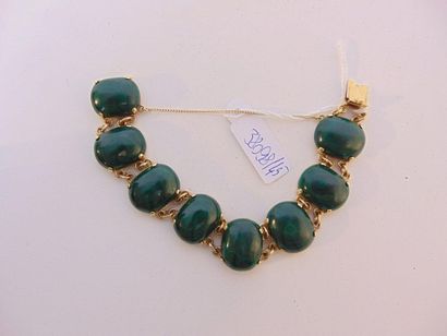 null Bracelet in 18 carat yellow gold set with malachite cabochons, punch, l. 18...