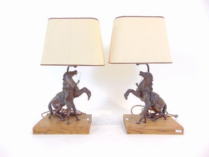 null Pair of table lamps decorated with the Horses of Marly (Coustou), 20th century,...
