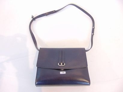 DELVAUX - BRUXELLES Navy leather handbag, with mirror (Christian Dior) and cover,...