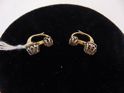 null Pair of 18 karat yellow gold earrings set with antique cut gemstones, h. 1.5...