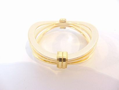 null Three gold-plated metal bracelets [wear and tear].