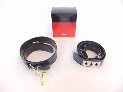 CELINE - PARIS Two navy leather belts, with a box [wear and tear].