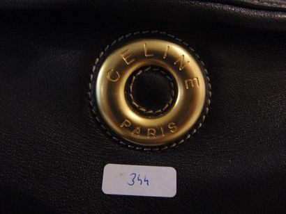 CELINE - PARIS Rectangular black leather handbag, with cover, l. 22 cm [wear and...