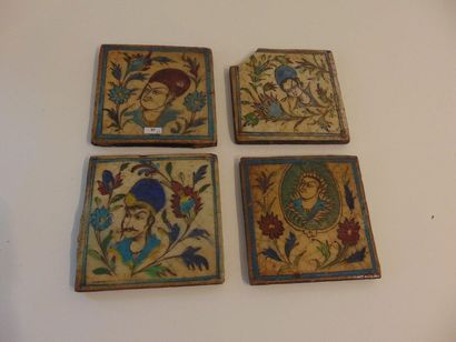 PROCHE-ORIENT Suite of four face-decorated siliceous ceramic tiles in a vegetal surround,...