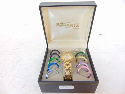 RODANIA Ladies' gold-plated metal wristwatch with interchangeable anodized bezels,...