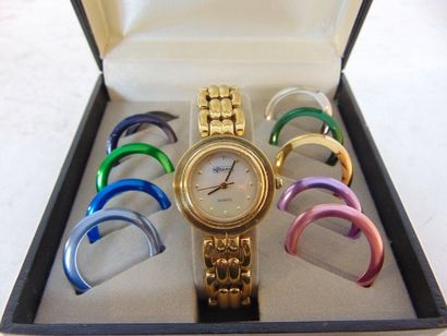 RODANIA Ladies' gold-plated metal wristwatch with interchangeable anodized bezels,...