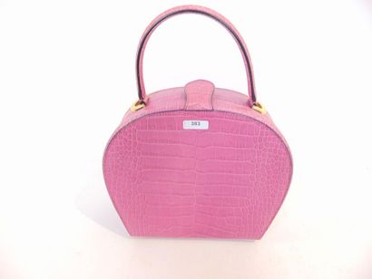 CELINE - PARIS Handbag in pink crocodile style leather, with cover, l. 25 cm.