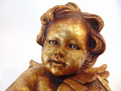 null Musical angel, 20th, subject in composition with a golden patina, h. 37 cm.