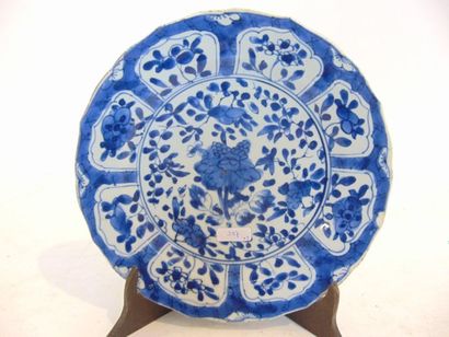 CHINE Octagonal plate with blue and white landscape decoration, Indian Companies,...