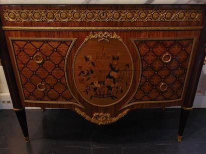 null An important Louis XVI style chest of drawers, opening with three drawers (one...