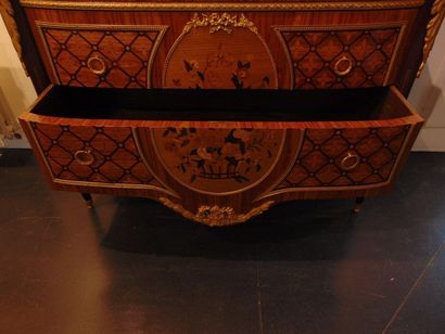 null An important Louis XVI style chest of drawers, opening with three drawers (one...