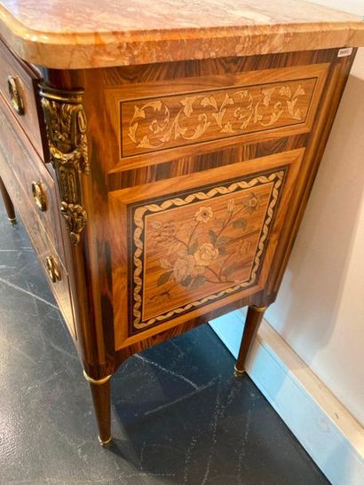 null Louis XVI style chest of drawers opening by three drawers (one in the belt),...