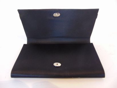 DELVAUX - BRUXELLES Navy leather pouch, l. 18.5 cm; an evening clutch is attache...