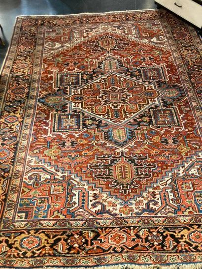 null Large Nahavand style Persian carpet with central medallion and stylized polychrome...