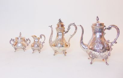 null Quadripod tea service in the Rocaille style, late 19th century, chased silver...