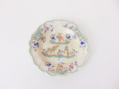 MOUSTIERS Three crocheted plates (one soup bowl and one pair) with polychrome grotesque...