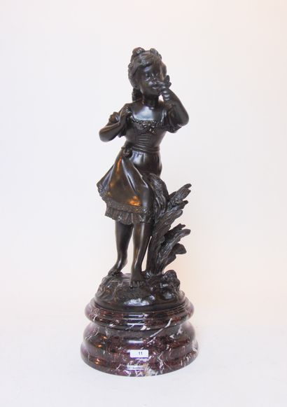 MOREAU Auguste (1834-1917) "Fillette à l'oiseau", early 20th century, patinated bronze...