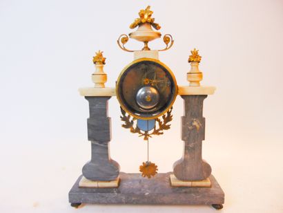 null Louis XVI period portal clock, late 18th century, marble, chased and gilded...